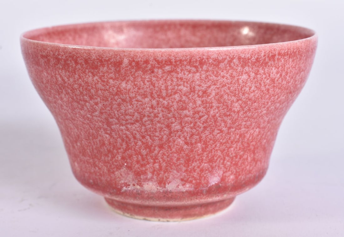 A CHINESE RED GLAZED OGEE FORM PORCELAIN TEABOWL. 9 cm wide. (1 of 4)