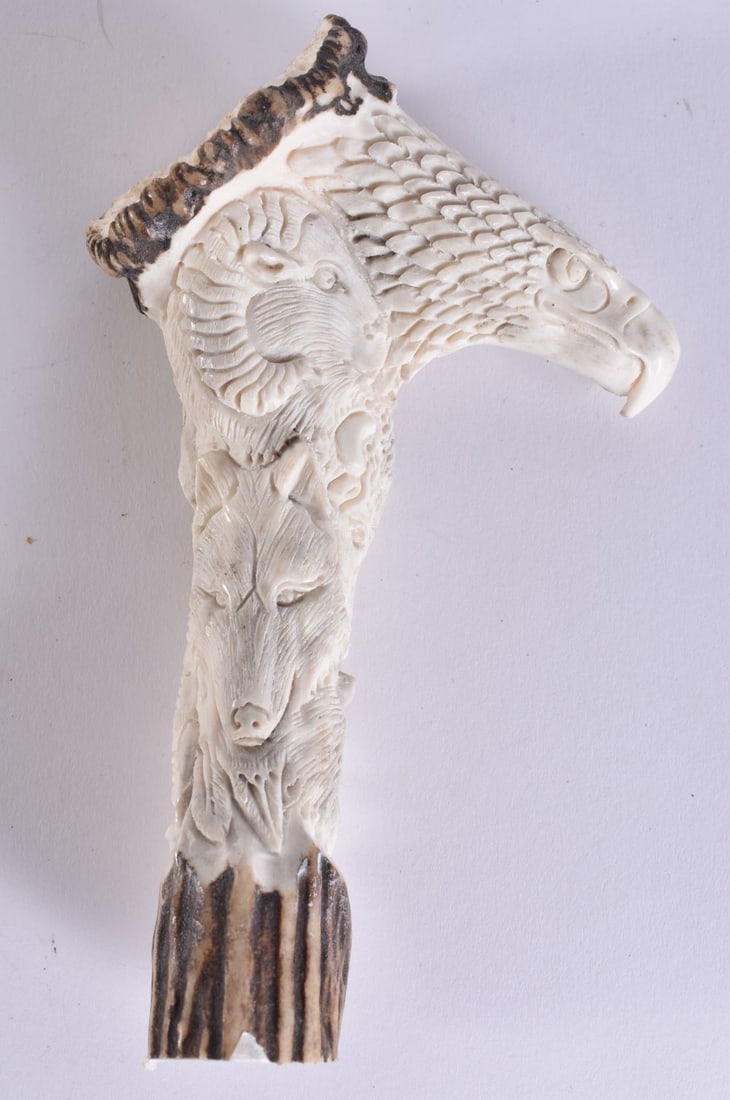 A STAG ANTLER EAGLE CANE HANDLE. 13 cm x 7 cm. (1 of 4)