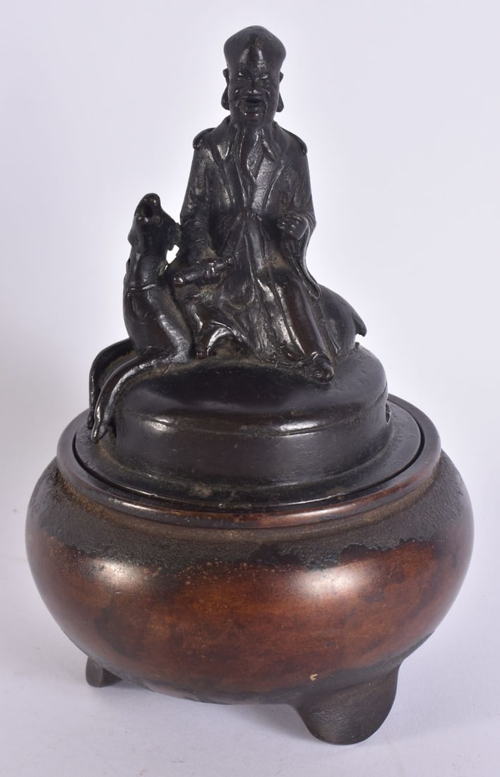 A CHINESE BRONZE FIGURAL CENSER AND COVER. 16 cm high. (1 of 5)