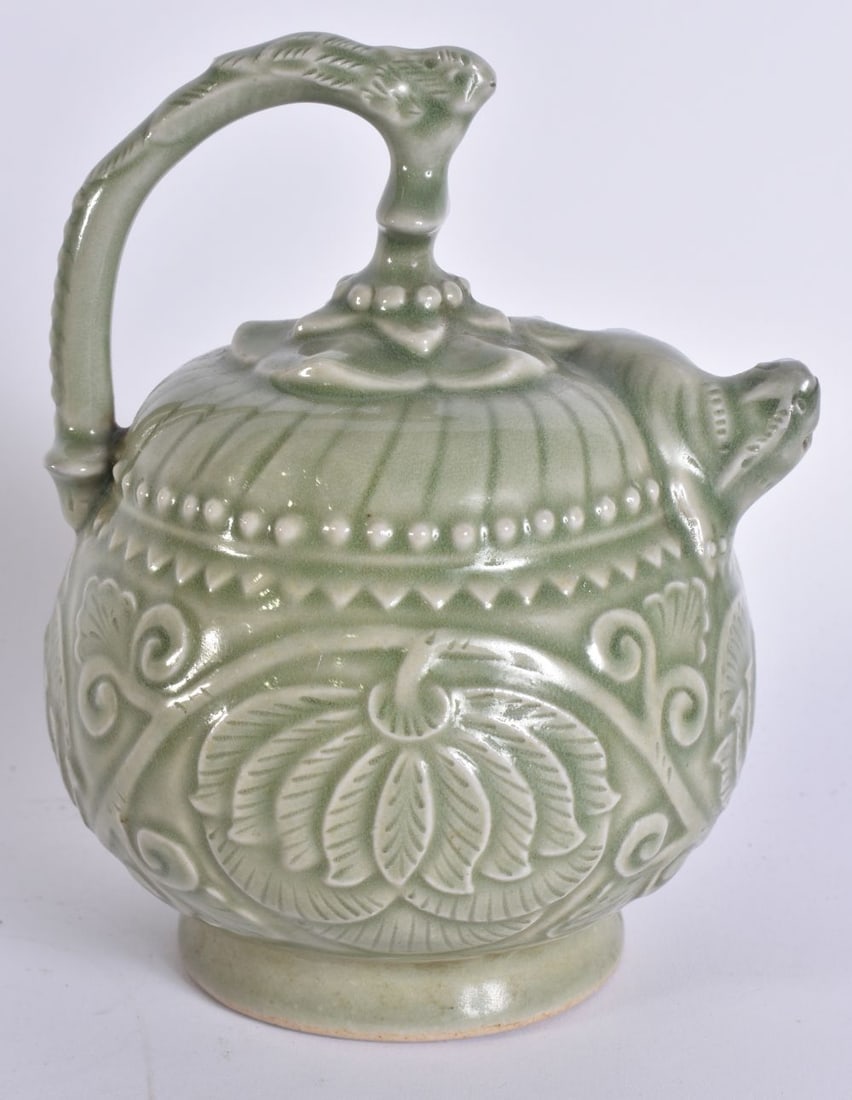 A CHINESE CELADON EWER. 17 cm x 9 cm. (1 of 4)