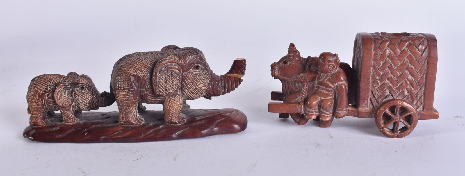TWO JAPANESE WOOD CARVINGS. Largest 10 cm wide. (2) (1 of 5)