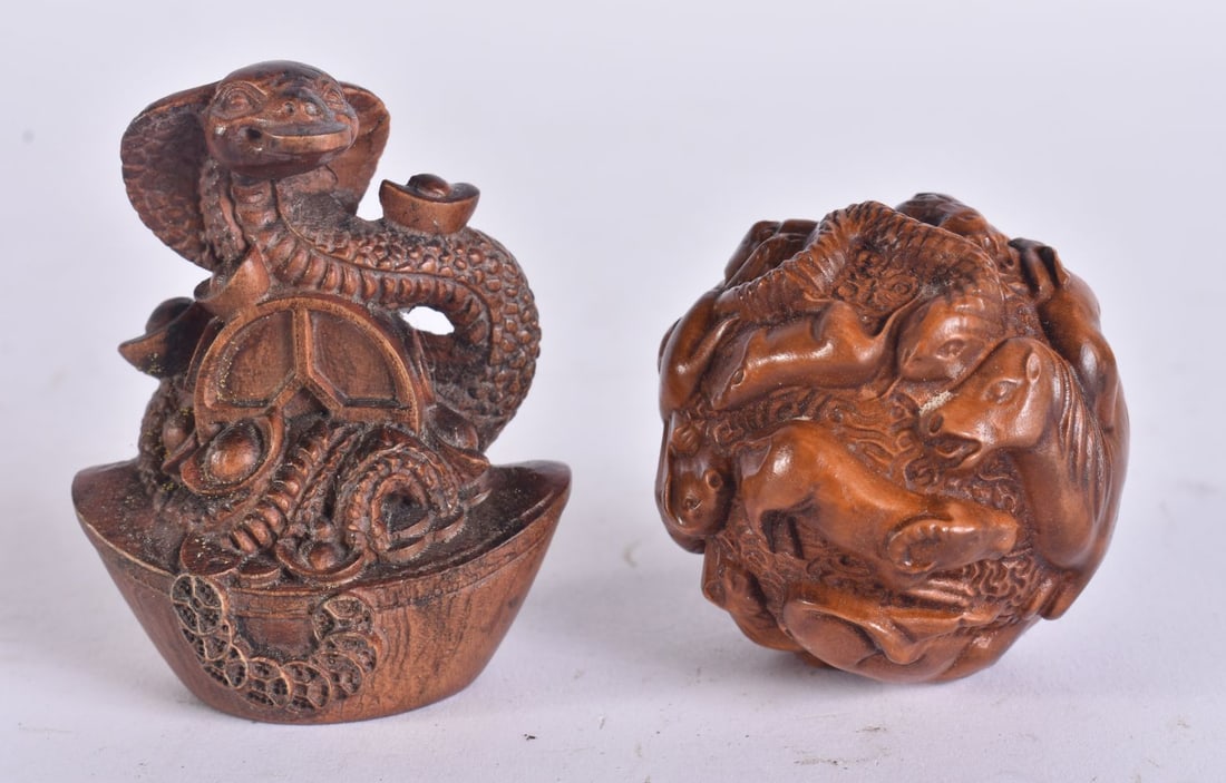 TWO JAPANESE WOOD CARVINGS. 6 cm wide. (2) (1 of 3)