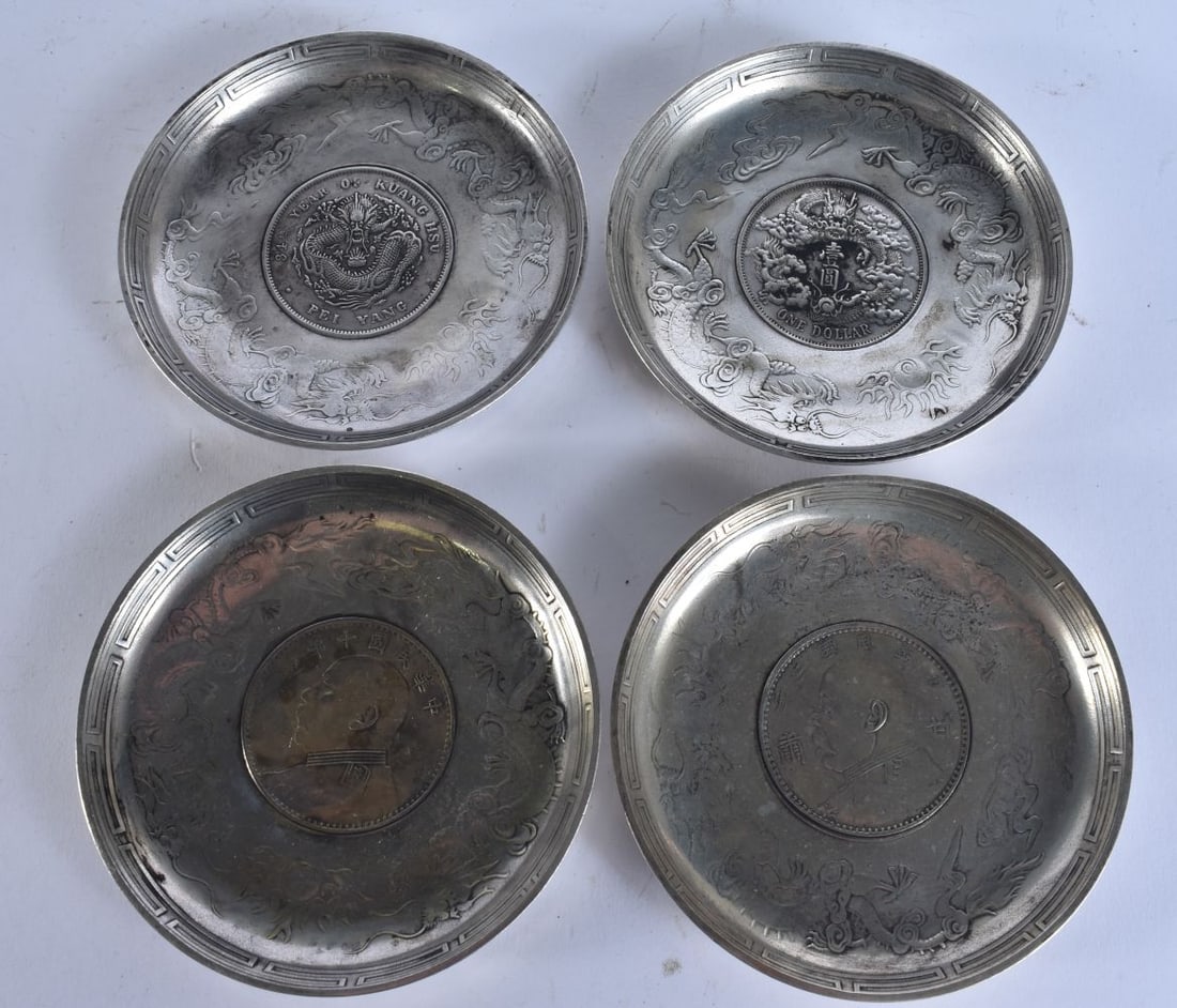 FOUR CHINESE WHITE METAL COIN DISHES. 9 cm wide. (4) (1 of 4)