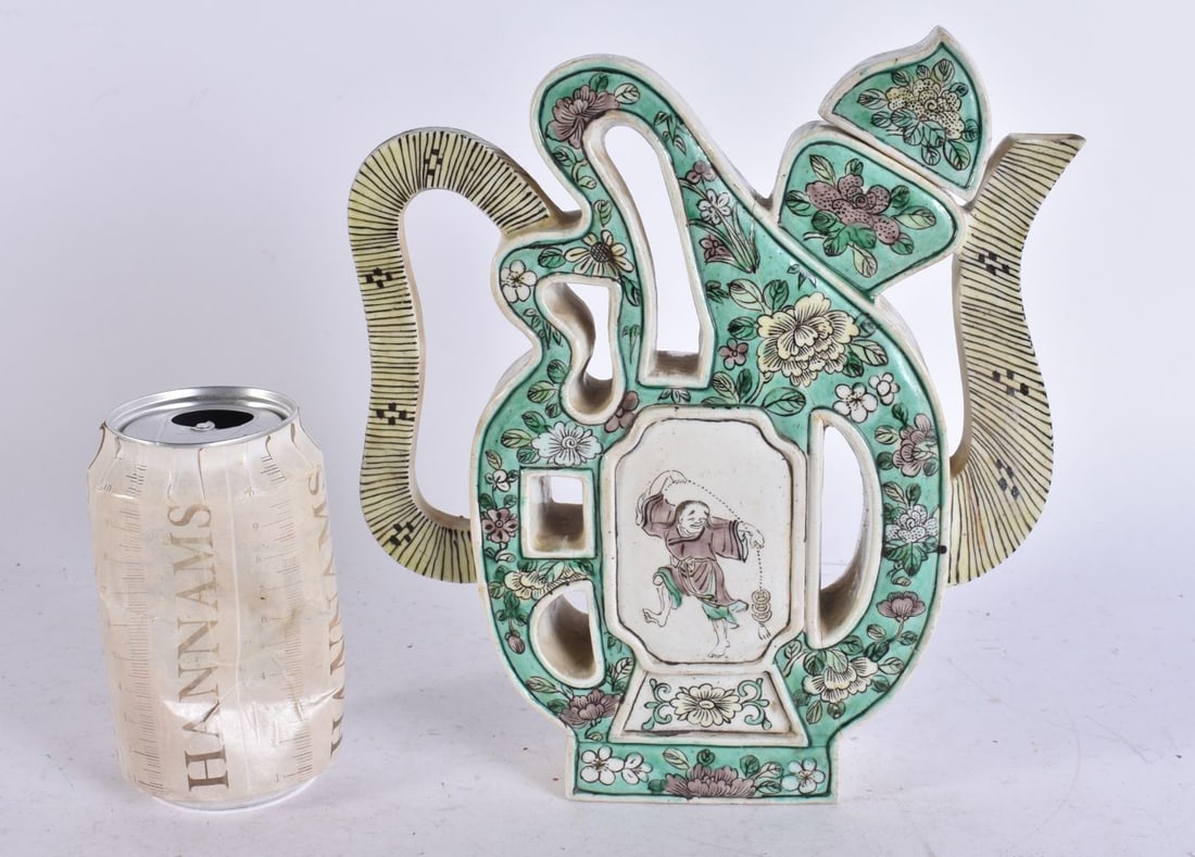 A 19TH CENTURY CHINESE FAMILLE VERTE S FORM TEAPOT AND COVER bearing Kangxi marks to base. 23 cm x 1: A 19TH CENTURY CHINESE FAMILLE VERTE S FORM TEAPOT AND COVER bearing Kangxi marks to base. 23 cm x 16 cm.