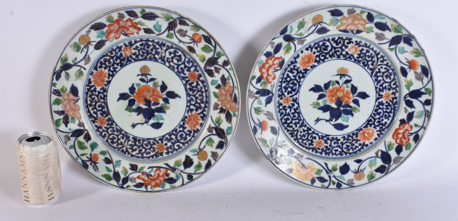 A LARGE PAIR OF EARLY 18TH CENTURY JAPANESE EDO PERIOD PLATES painted with flowers. 32 cm wide. (1 of 6)