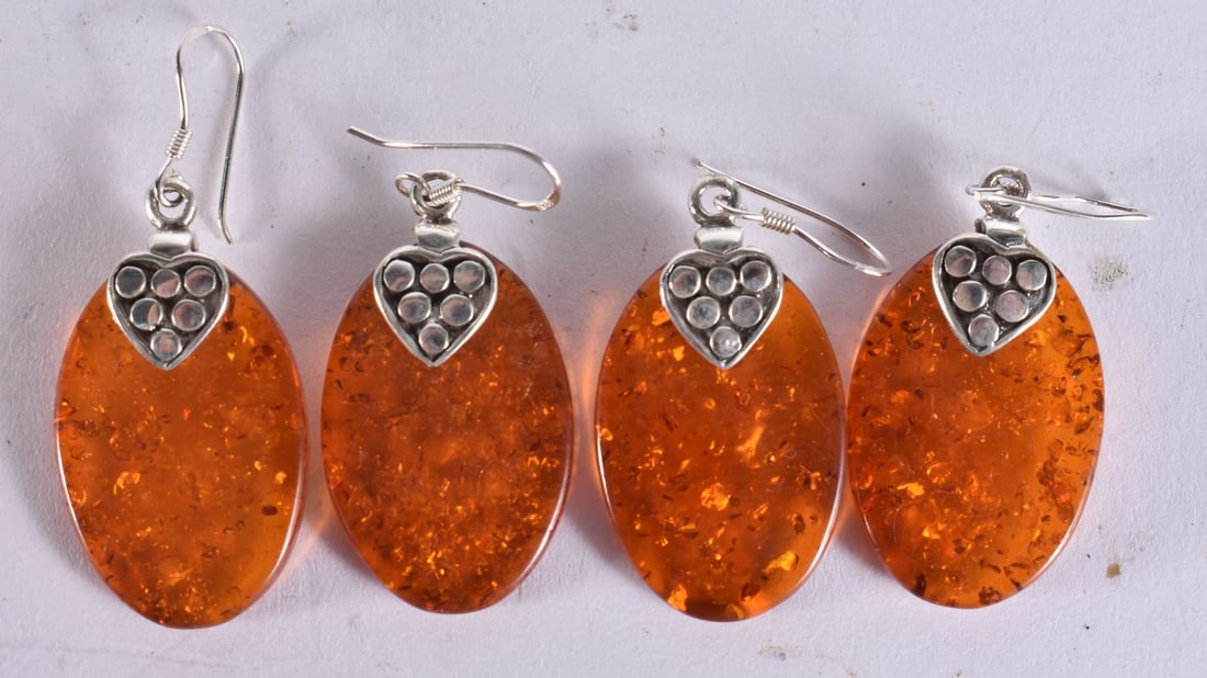 TWO PAIRS OF SILVER AND AMBER EARRINGS. (4): TWO PAIRS OF SILVER AND AMBER EARRINGS. (4)
