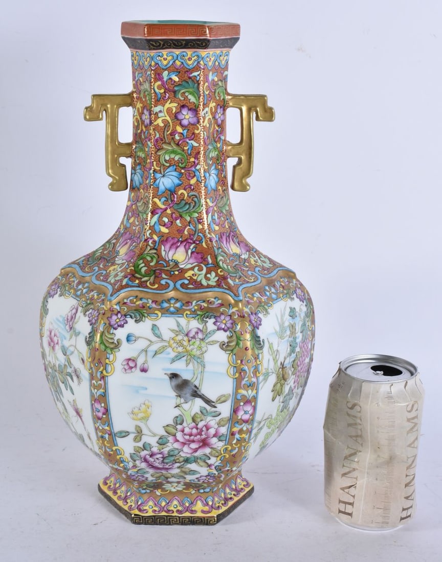 A CHINESE TWIN HANDLED FAMILLE ROSE PORCELAIN VASE. 34 cm high. (1 of 7)