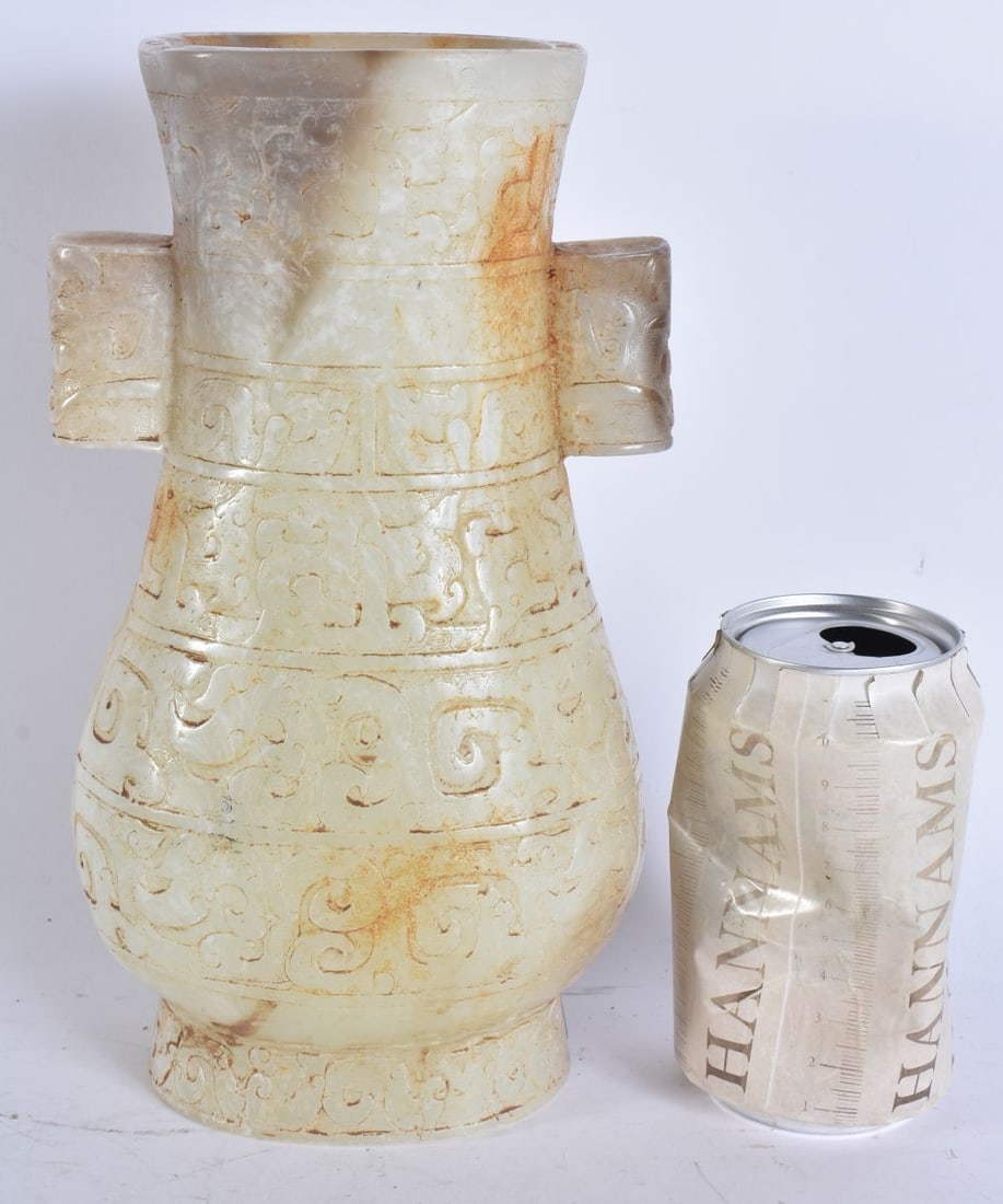 A CHINESE WHITE JADE TYPE ARROW VASE. 24.5 cm high. (1 of 6)