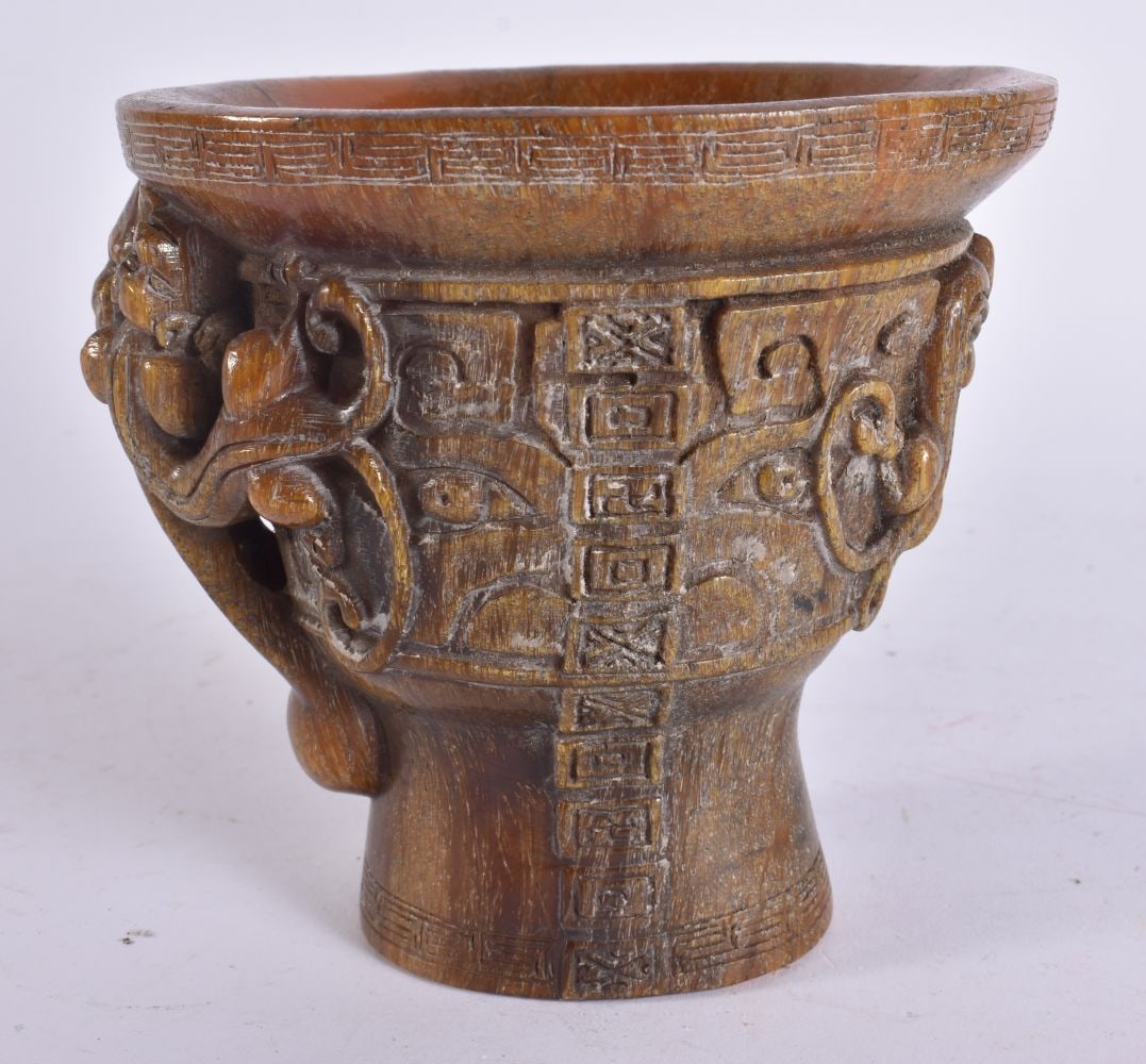 A CHINESE CARVED BUFFALO HORN TYPE LIBATION CUP. 13 cm x 13 cm. (1 of 6)