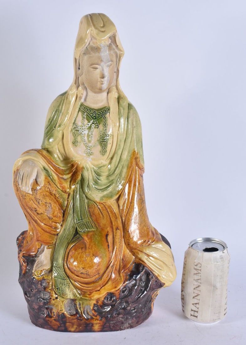 A CHINESE QING DYNASTY SANCAI GLAZED POTTERY IMMORTAL. 41.5 cm high.: A CHINESE QING DYNASTY SANCAI GLAZED POTTERY IMMORTAL. 41.5 cm high.