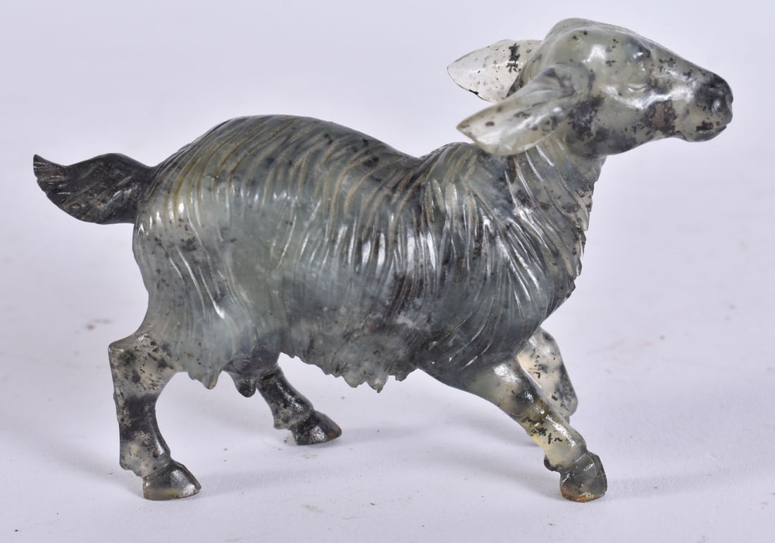 A CHINESE CARVED JADE GOAT. 10 cm wide. (1 of 5)