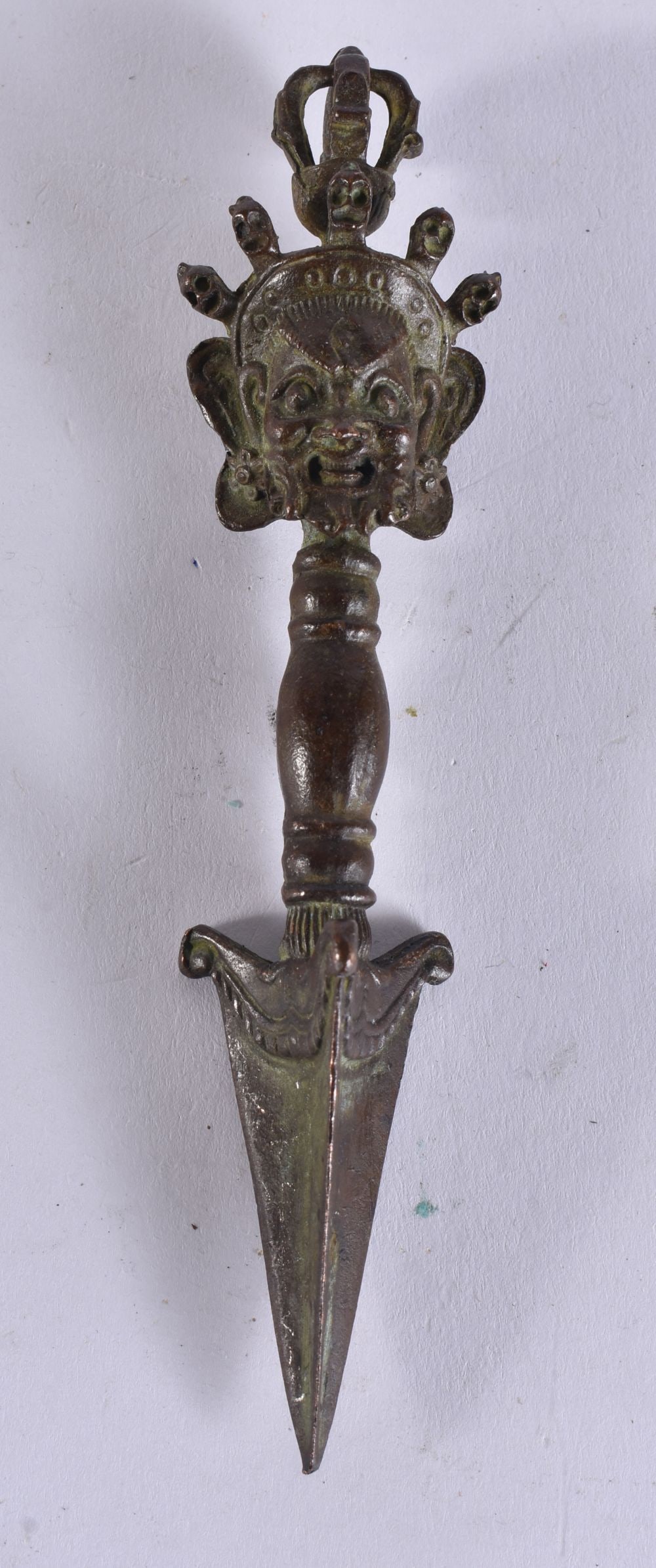 A TIBETAN BRONZE PHURBA. 8 cm long. (1 of 3)