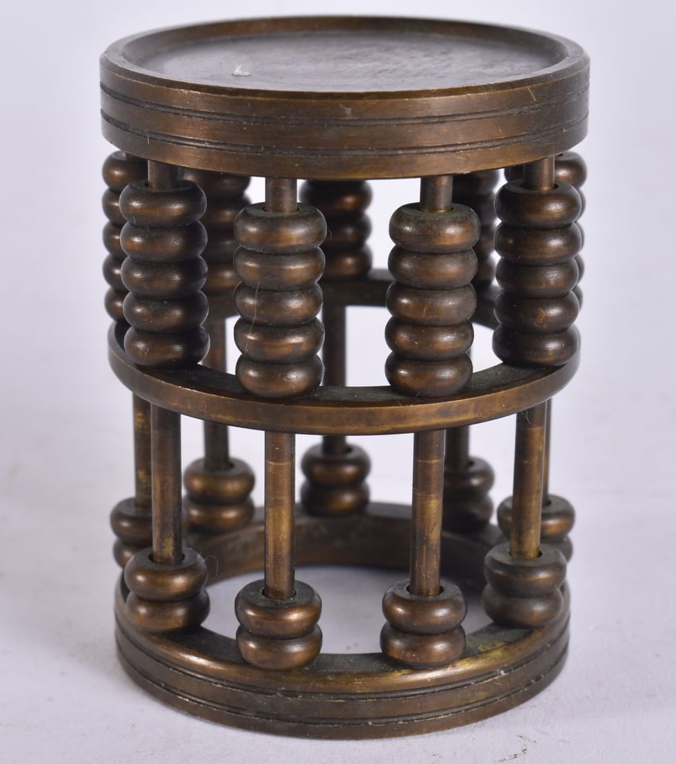 A CHINESE BRONZE ABACUS. 6 cm high. (1 of 4)