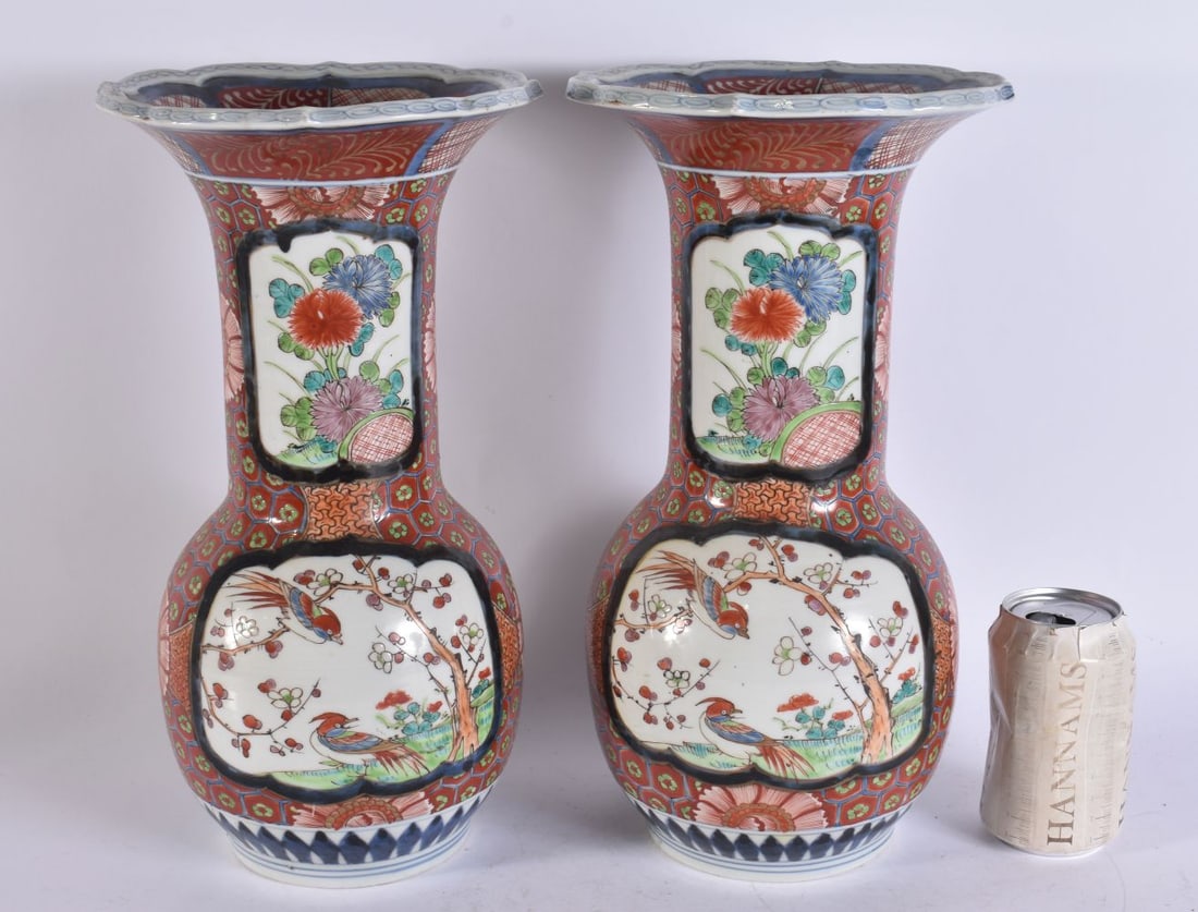 A PAIR OF 19TH CENTURY JAPANESE MEIJI PERIOD KUTANI PORCELAIN VASES. 37 cm high. (1 of 6)