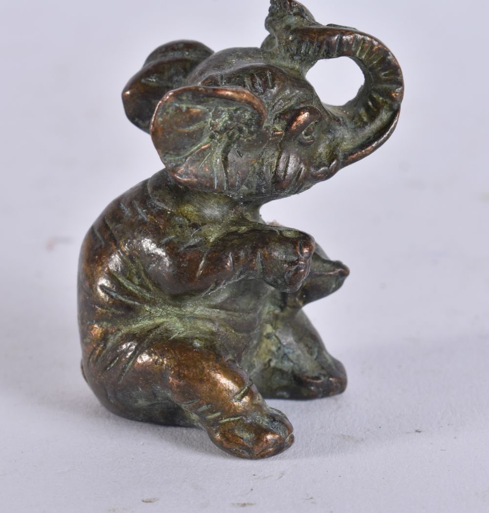 A JAPANESE BRONZE ELEPHANT. 4.5 cm high. (1 of 4)