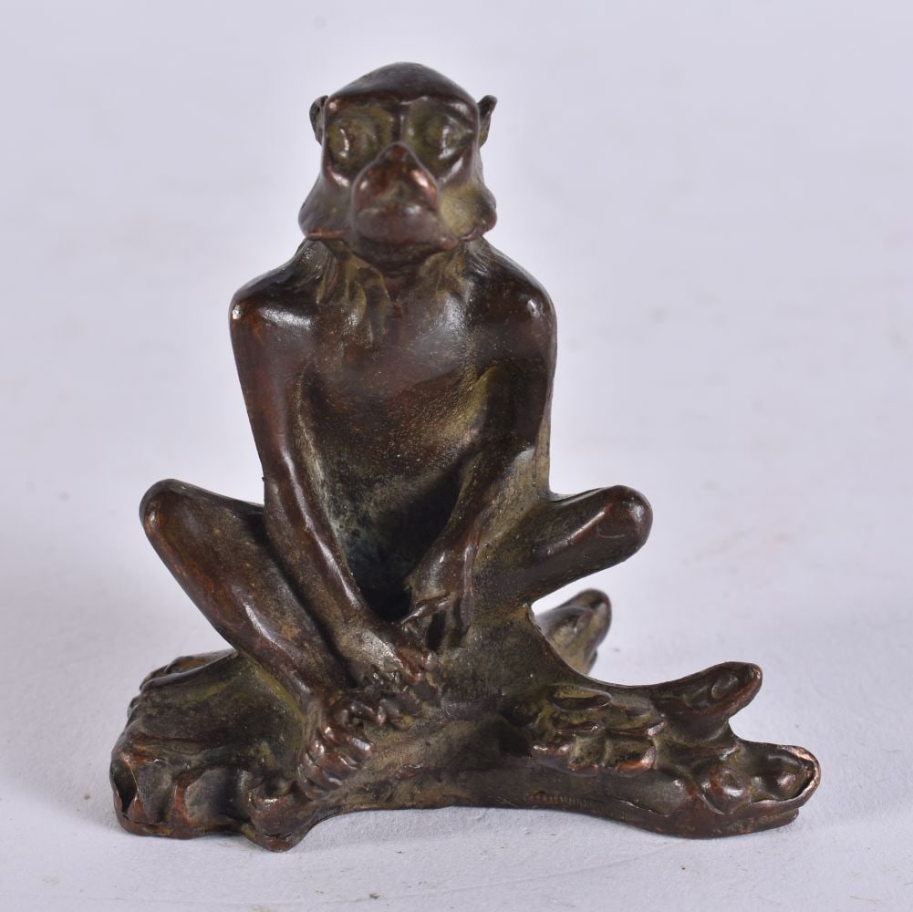 A JAPANESE BRONZE MONKEY. 7 cm high. (1 of 3)