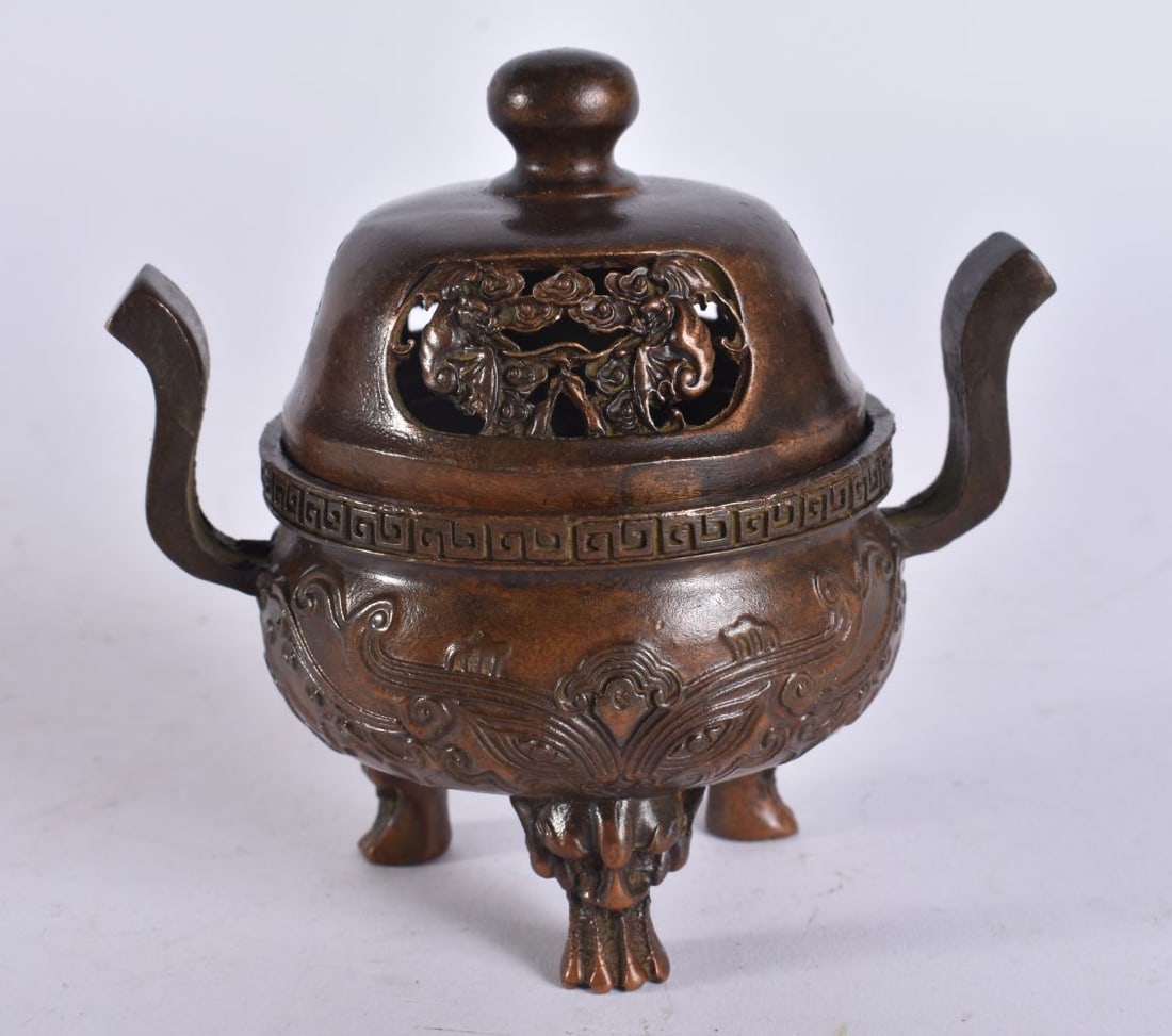 A CHINESE BRONZE CENSER. 8 cm wide. (1 of 5)