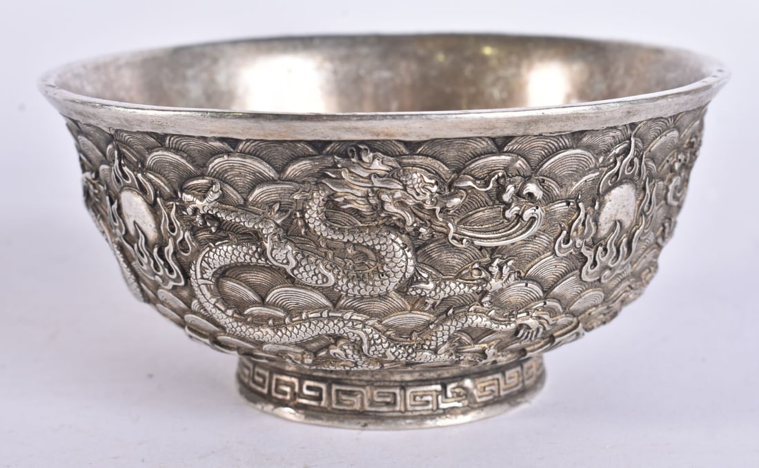A CHINESE WHITE METAL DRAGON BOWL. 12 cm wide. (1 of 4)
