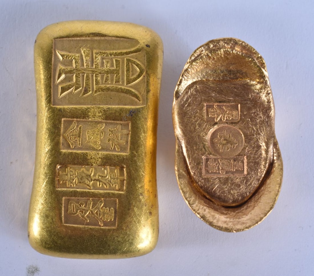 TWO CHINESE YELLOW METAL SCROLL WEIGHTS. Largest 6.25 cm long. (2) (1 of 4)