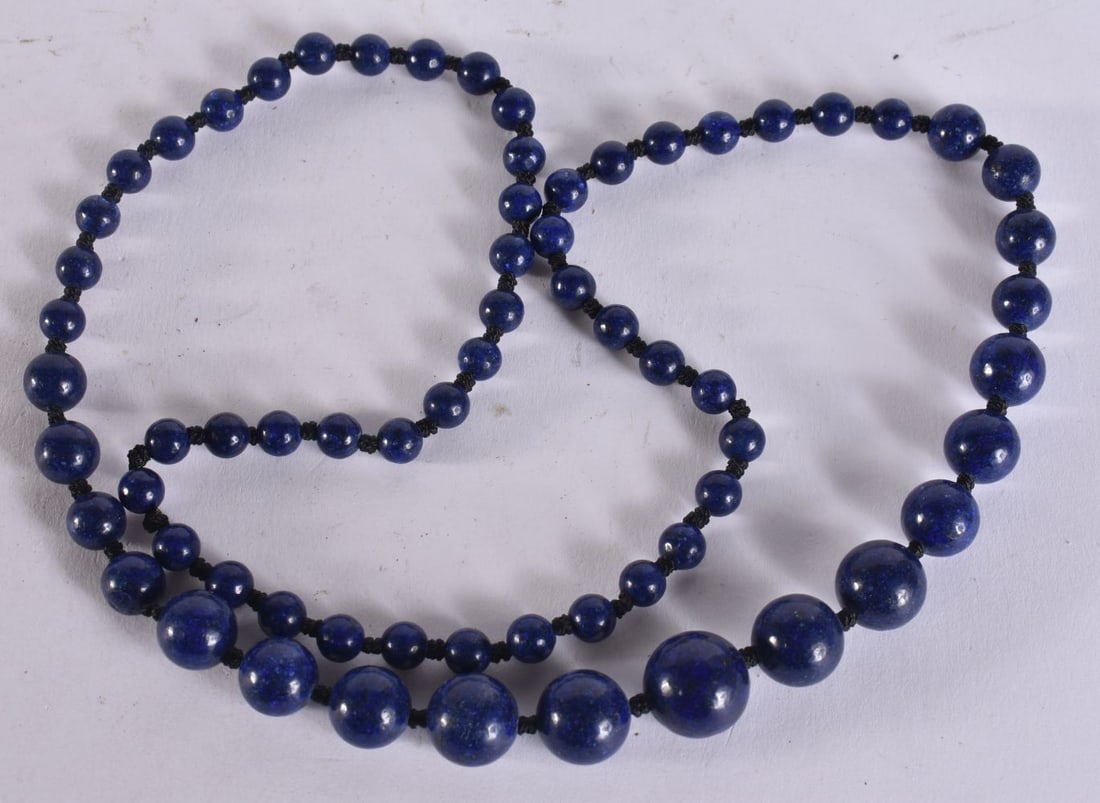 A CHINESE LAPIS LAZULI NECKLACE. 60 cm long. (1 of 3)
