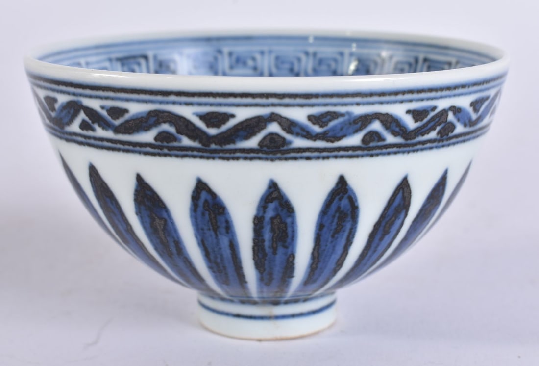 A CHINESE BLUE AND WHITE PORCELAIN LOTUS FORM BOWL. 9 cm wide. (1 of 4)