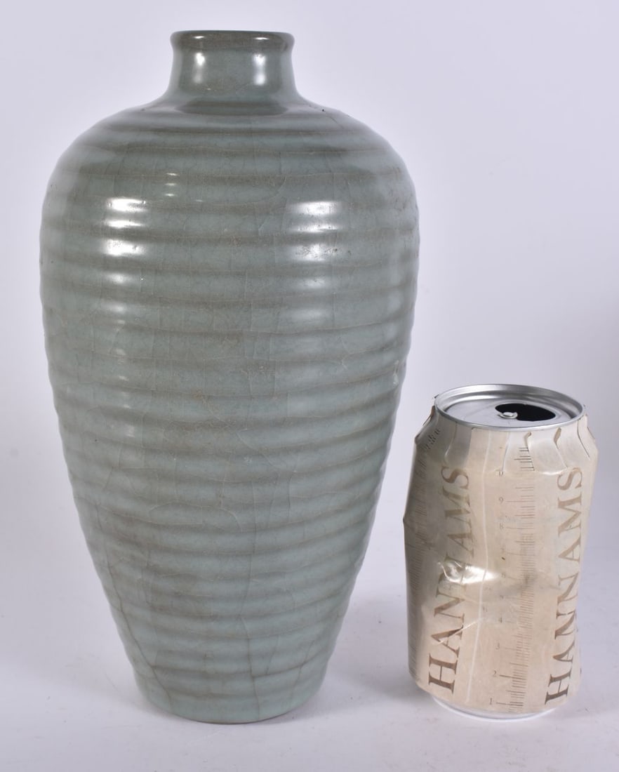 A CHINESE RIBBED MONOCHROME VASE. 25 cm high. (1 of 4)