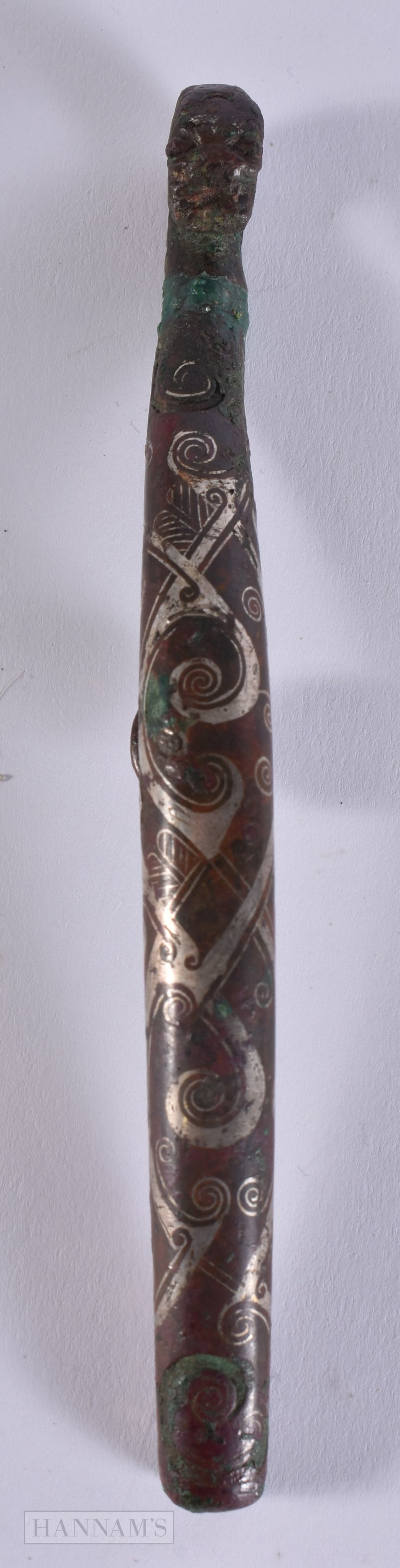 A CHINESE SILVER-INLAID BRONZE BELT HOOK WARRING STATES PERIOD (475-221 BC). 13.75 cm long. Note: Se (1 of 9)