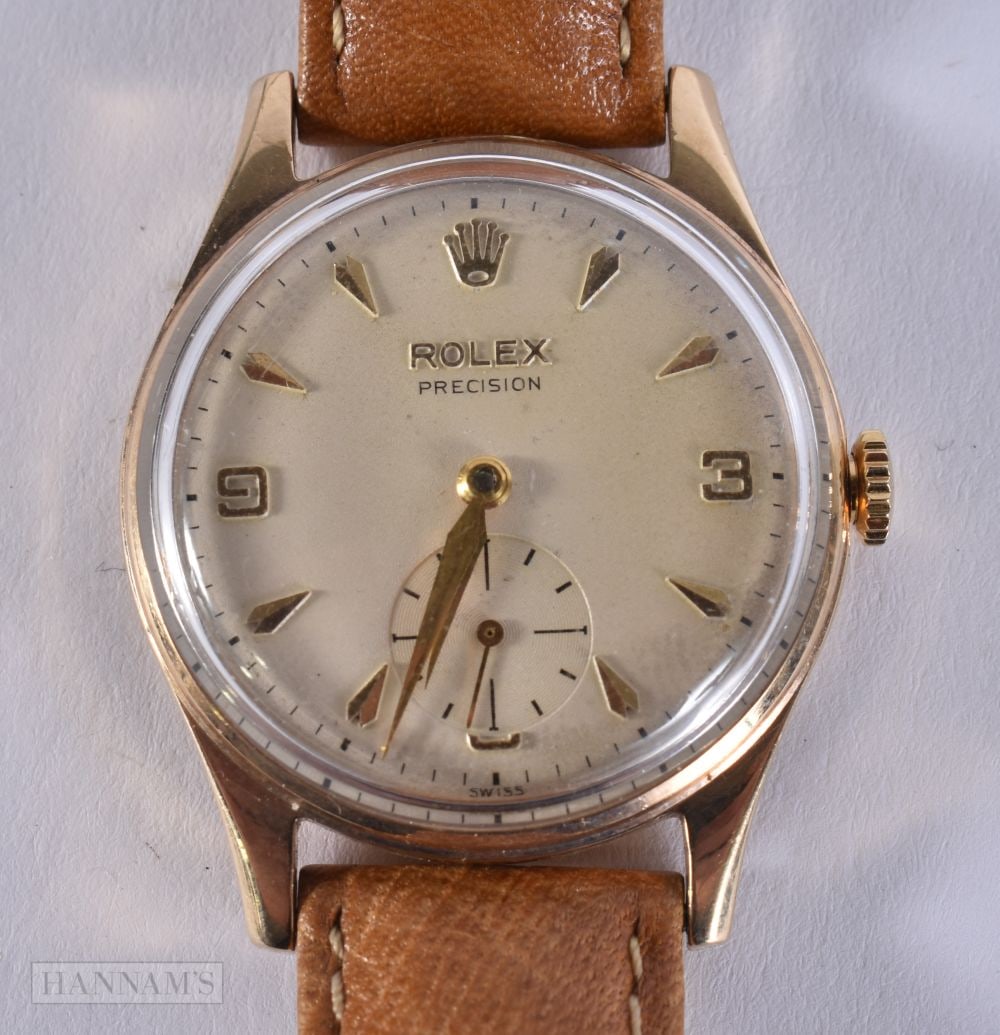A VINTAGE 9CT ROLEX WRISTWATCH. Running. 3 cm wide, strap 21 cm long: A VINTAGE 9CT ROLEX WRISTWATCH. Running. 3 cm wide, strap 21 cm long
