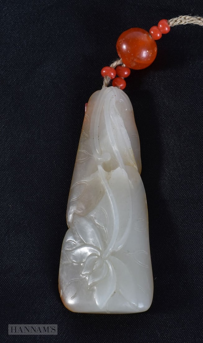 A FINE CHINESE QING DYNASTY CARVED GREENISH WHITE JADE PENDANT. Jade 6.5 cm x 2.5 cm. (1 of 9)