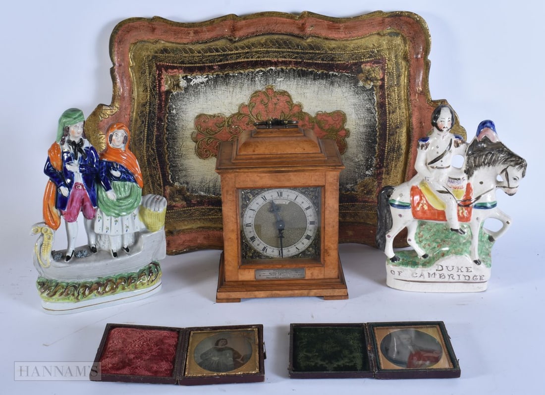 AN ANTIQUE CLOCK together with Staffordshire figures etc. (qty) (1 of 8)