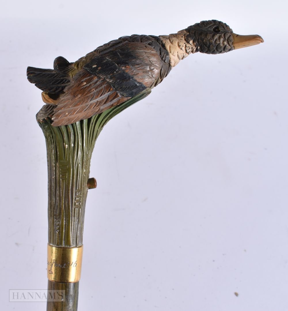 AN UNUSUAL ANTIQUE PAINTED WOOD AUTOMATON MALLARD PARASOL. 105 cm long.: AN UNUSUAL ANTIQUE PAINTED WOOD AUTOMATON MALLARD PARASOL. 105 cm long.