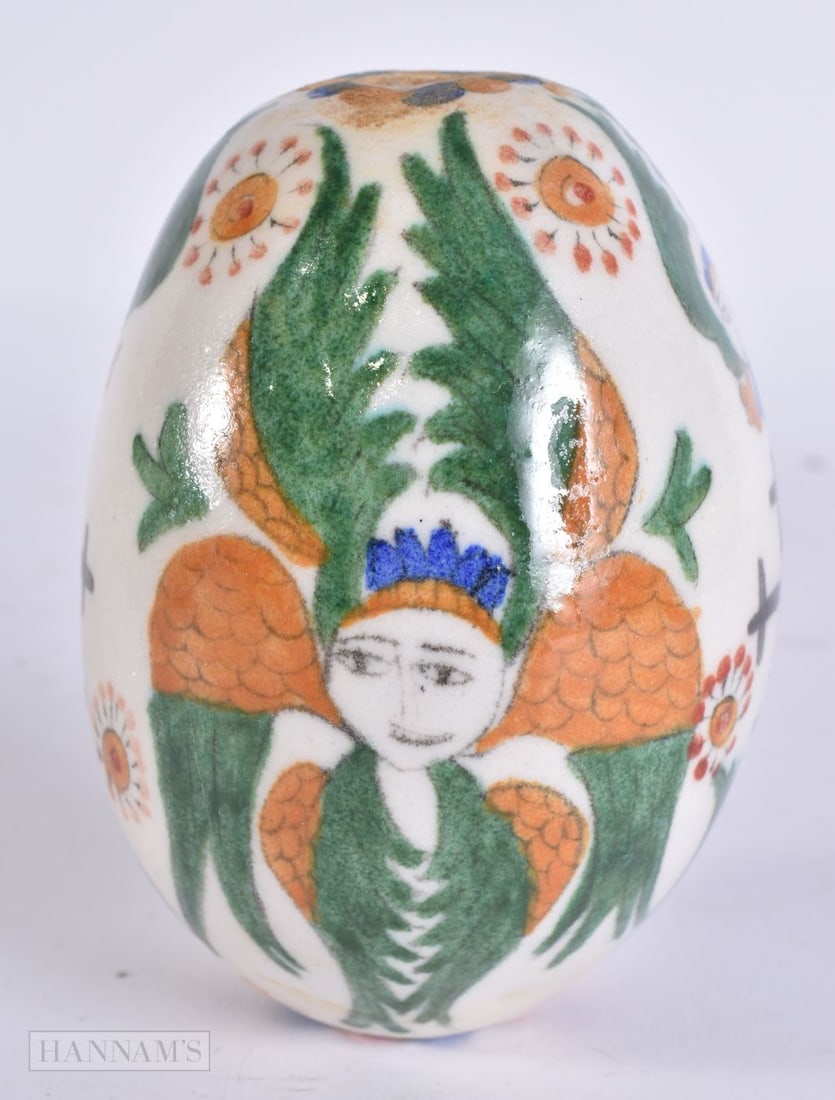 A TURKISH KUTAHYA HANGING POTTERY EGG. 10.5 cm high.: A TURKISH KUTAHYA HANGING POTTERY EGG. 10.5 cm high.