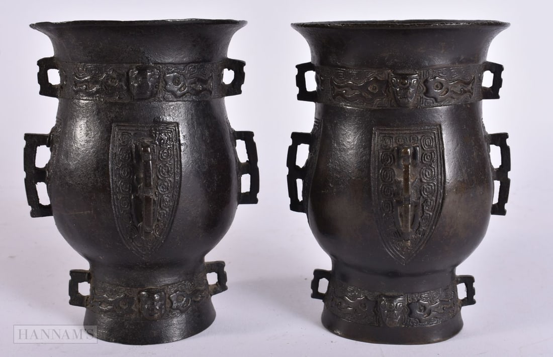 A PAIR OF 17TH CENTURY CHINESE BRONZE VASE Ming, with old collectors label and with diamond lattice (1 of 6)