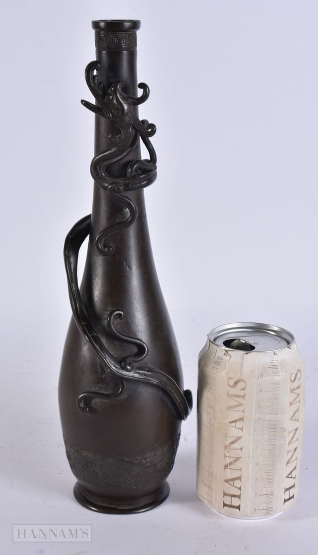 A LARGE 17TH CENTURY CHINESE SLENDER BRONZE VASE Ming, overlaid with an entwined kylin. 31 cm high.: A LARGE 17TH CENTURY CHINESE SLENDER BRONZE VASE Ming, overlaid with an entwined kylin. 31 cm high.