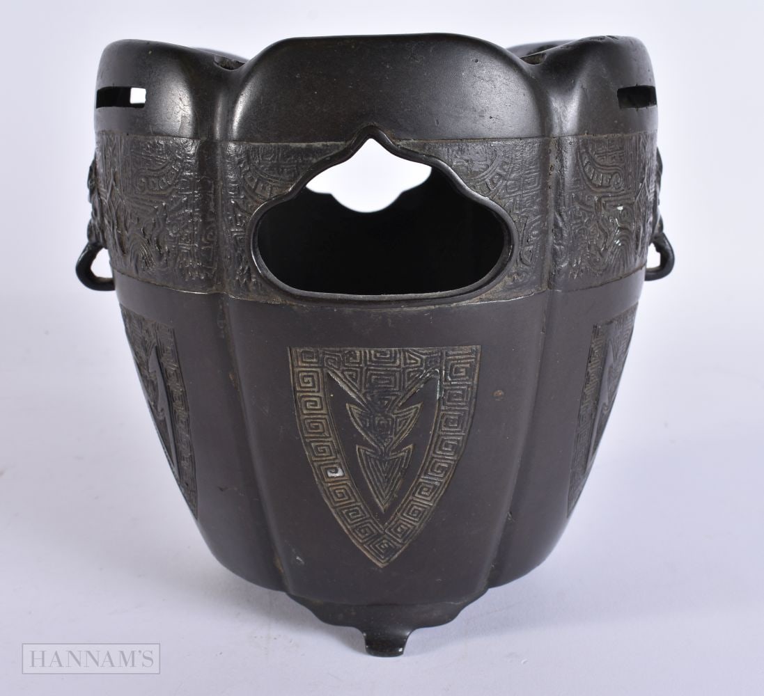 A 19TH CENTURY JAPANESE MEIJI PERIOD HIBACHI decorated with mask heads. 15 cm high. (1 of 7)