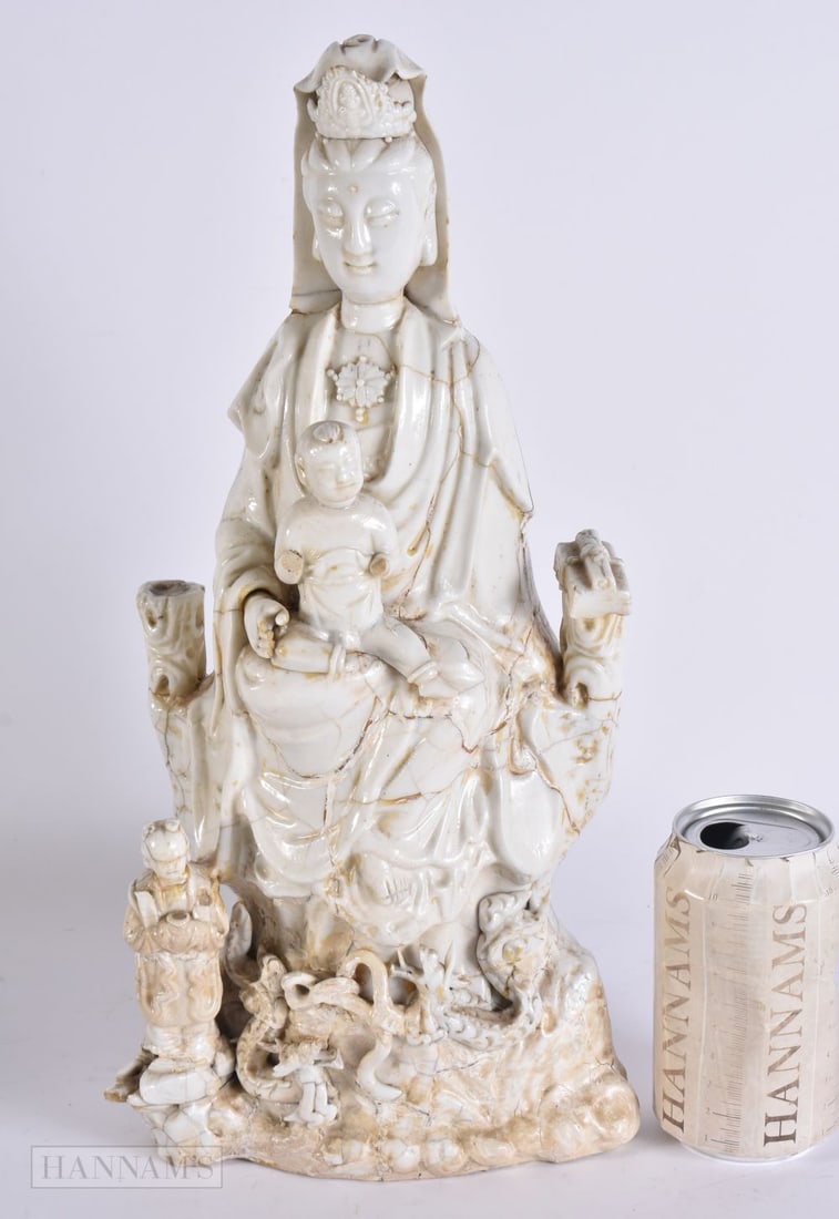 A 17TH CENTURY CHINESE BLANC DE CHINE DEHUA FIGURE OF GUANYIN Late Ming/Qing. 38 cm high. (1 of 6)