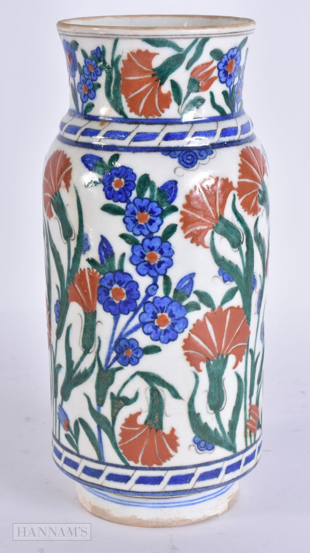 A TURKISH IZNIK POTTERY VASE. 26 cm high. (1 of 5)