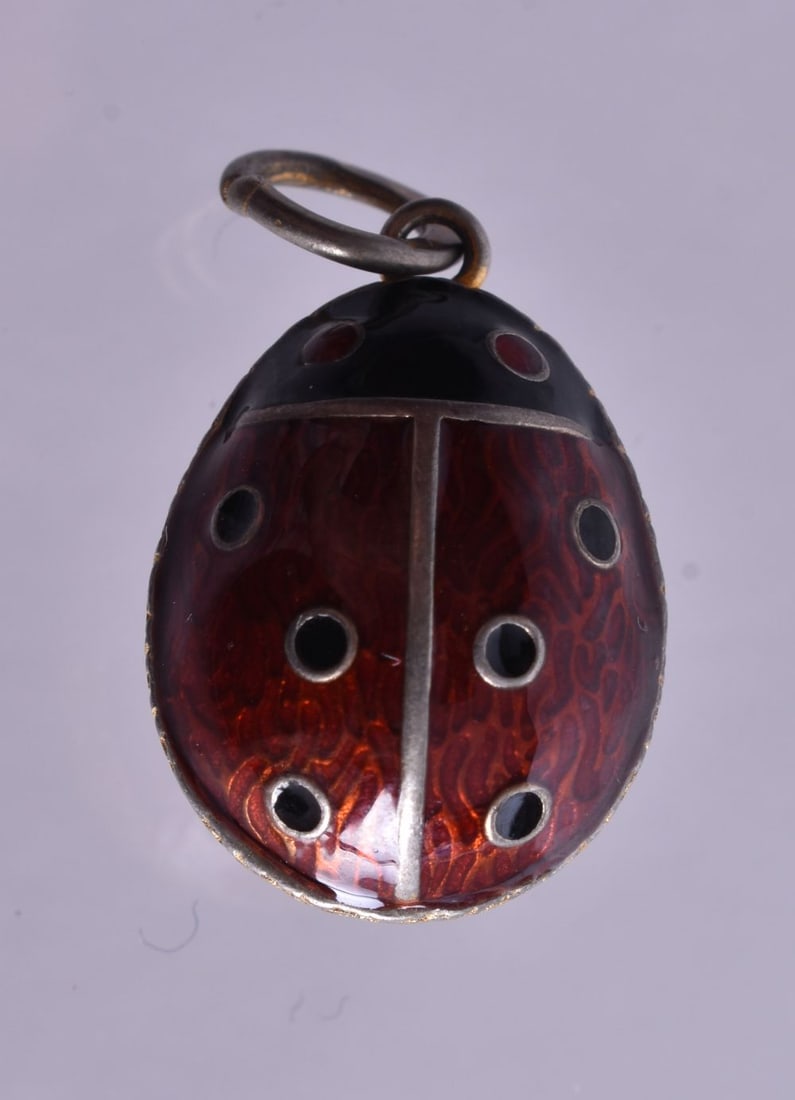 A Silver Gilt and Enamel Ladybird Pendant. Bail Stamped 84. 2cm x 1.4cm x 1.1cm, weight 5.4g (1 of 3)