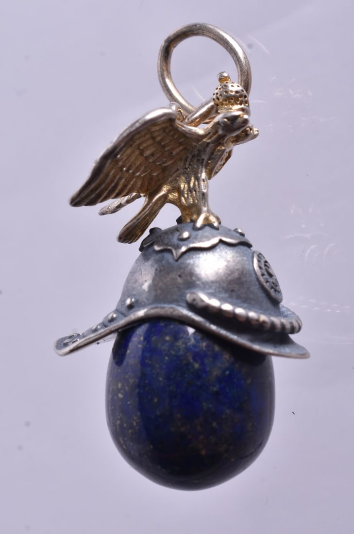 A Continental Silver Eagle atop a Helmet Mounted Hardstone Egg Pendant. Stamped 84, 4.8cm x 2.3cm x (1 of 3)