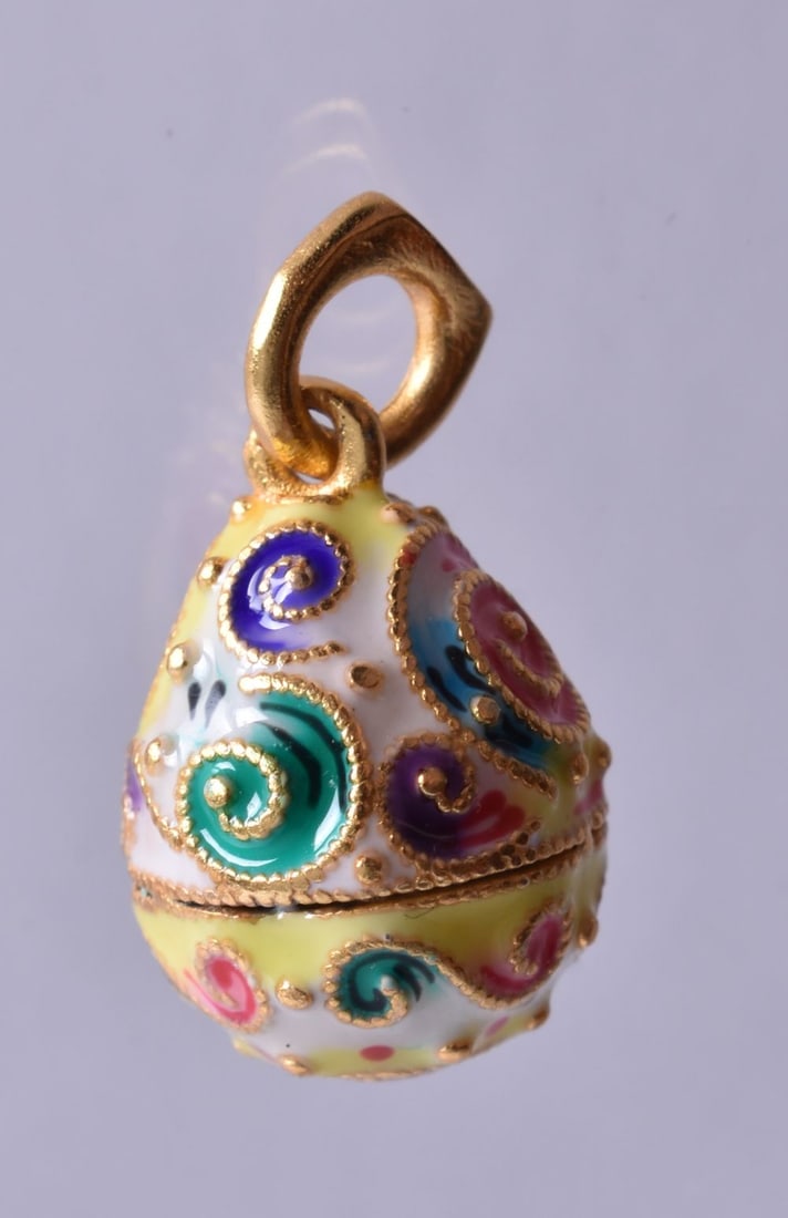 A Silver Gilt and Enamel Pendant. Bail Stamped 84. 1.7cm x 1.2cm, 4.9g (1 of 3)