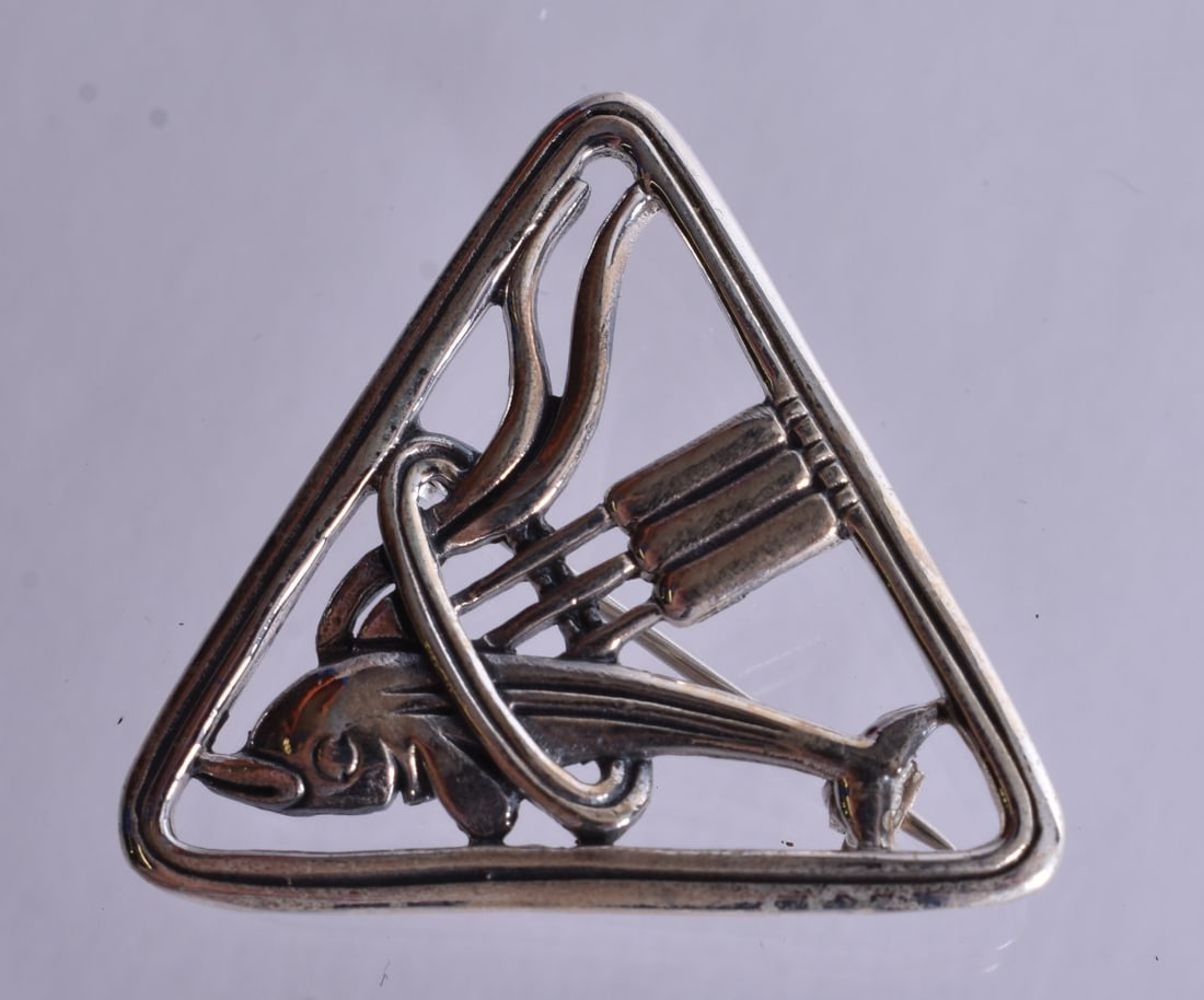 A Triangular Silver Dolphin Brooch. Stamped Sterling. 2.9cm x 3.2cm, weight 6.4g (1 of 2)