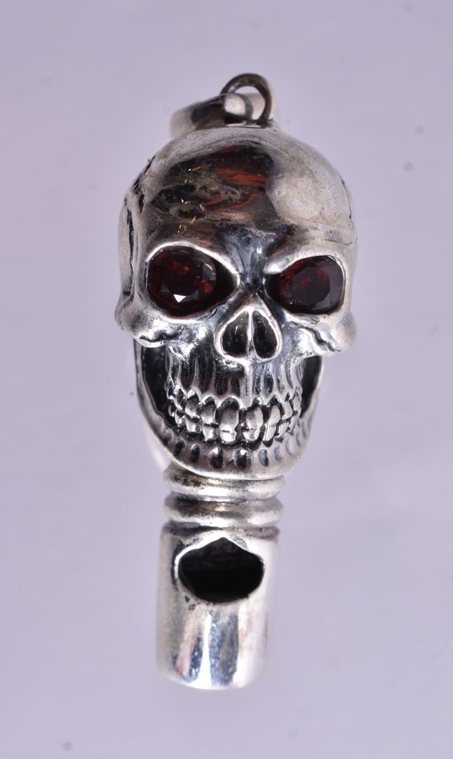 A Silver Skull Whistle Pendant. Stamped 925. 4.8cm x 1.8cm x 1.6cm, weight 16g: A Silver Skull Whistle Pendant. Stamped 925. 4.8cm x 1.8cm x 1.6cm, weight 16g