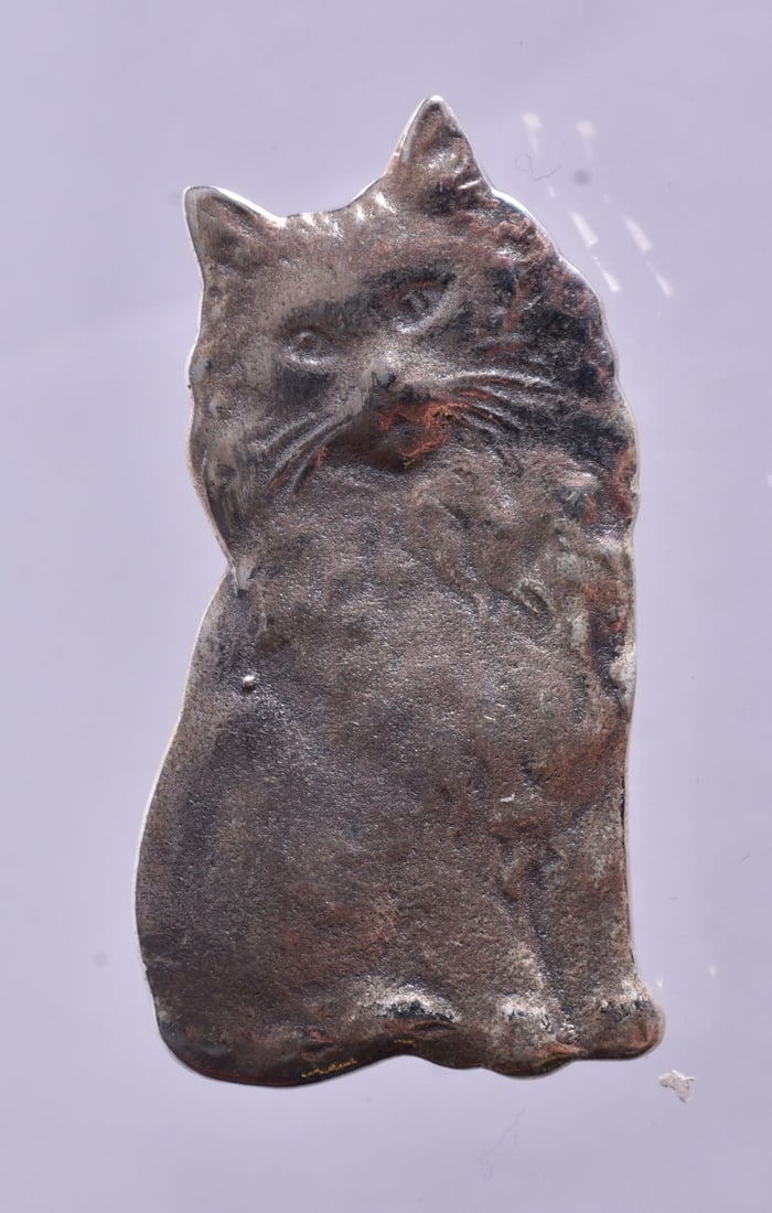A Silver Cat Brooch. Stamped Sterling. 3cm x 1.6cm, weight 4.6g (1 of 2)