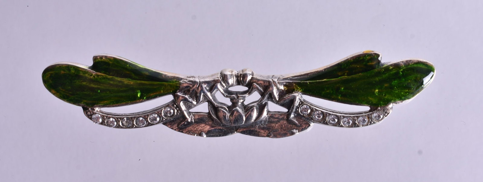 A Silver and Enamel Double Dragonfly Brooch. Stamped Sterling. 6.9cm x 1.4cm, weight 10.5g: A Silver and Enamel Double Dragonfly Brooch. Stamped Sterling. 6.9cm x 1.4cm, weight 10.5g