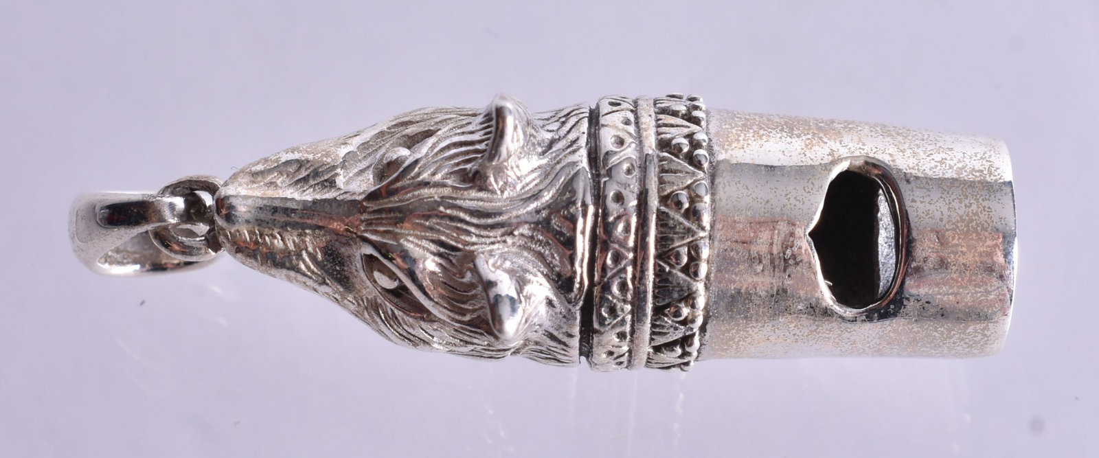 A Silver Wolf Whistle Pendant. Stamped 925. 4.6cm x 1.5cm x 1.3cm, weight 12.1g: A Silver Wolf Whistle Pendant. Stamped 925. 4.6cm x 1.5cm x 1.3cm, weight 12.1g