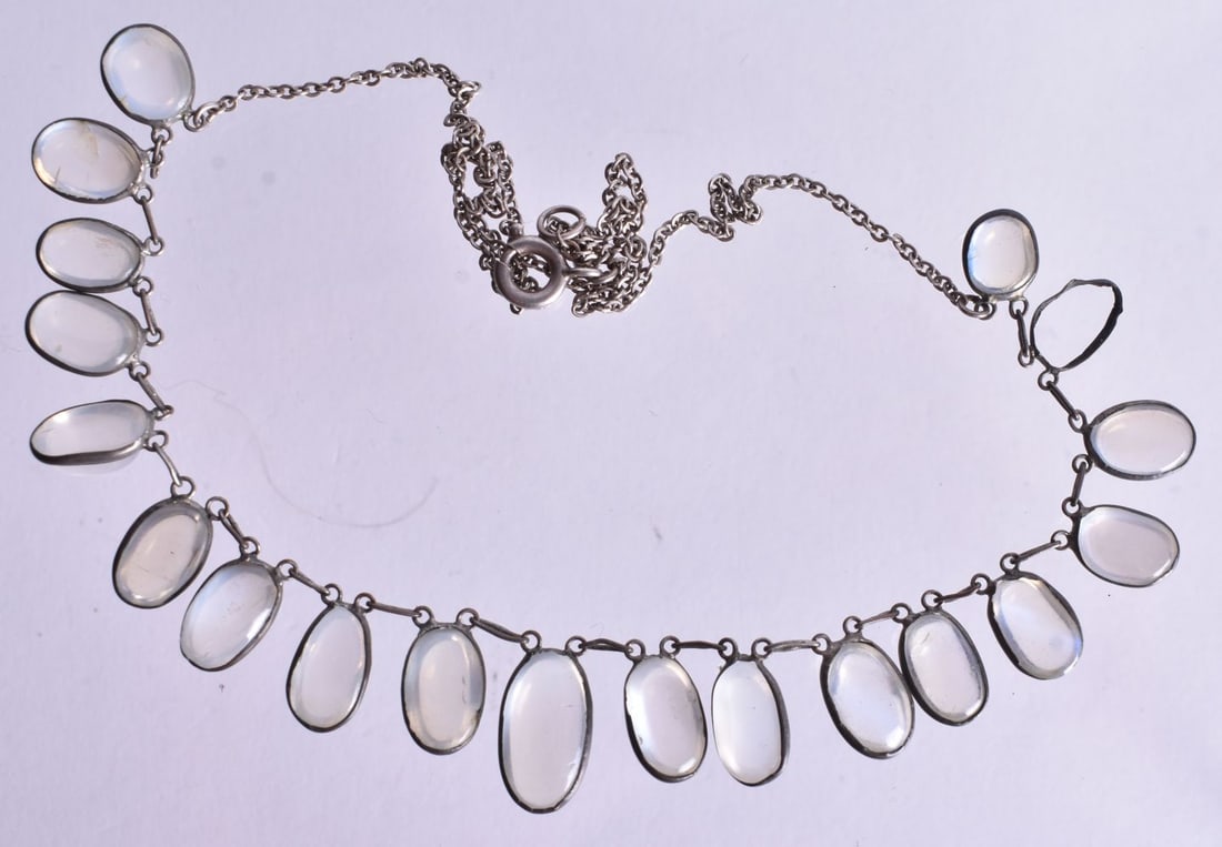 A Silver and Moonstone Necklace. Stamped Silver. Length 42cm, weight 7.3g: A Silver and Moonstone Necklace. Stamped Silver. Length 42cm, weight 7.3g