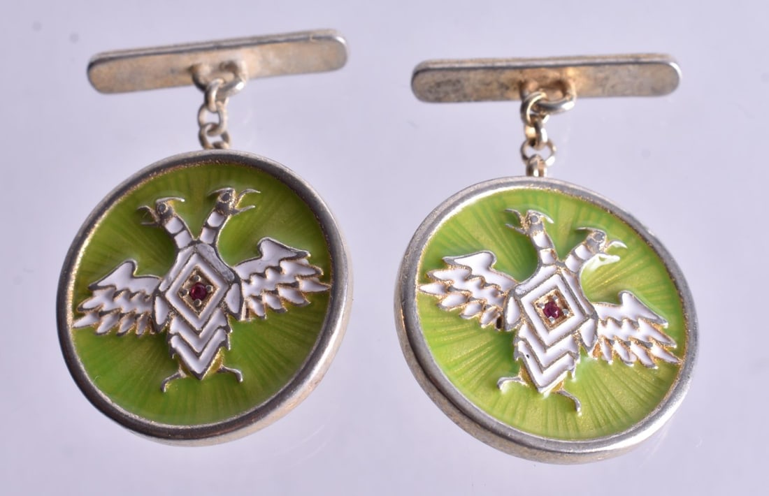 A Pair of Continental Silver and Green Enamel Eagle Cufflinks. Stamped 84. 1.9cm diameter, weight (1 of 2)