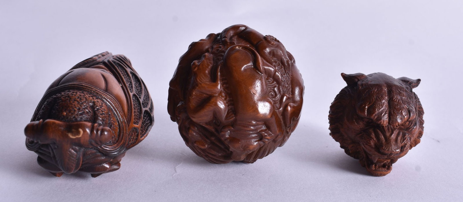 Three Carved Figures. Largest 3.2cm x 6.8cm x 3.8cm (3) (1 of 3)