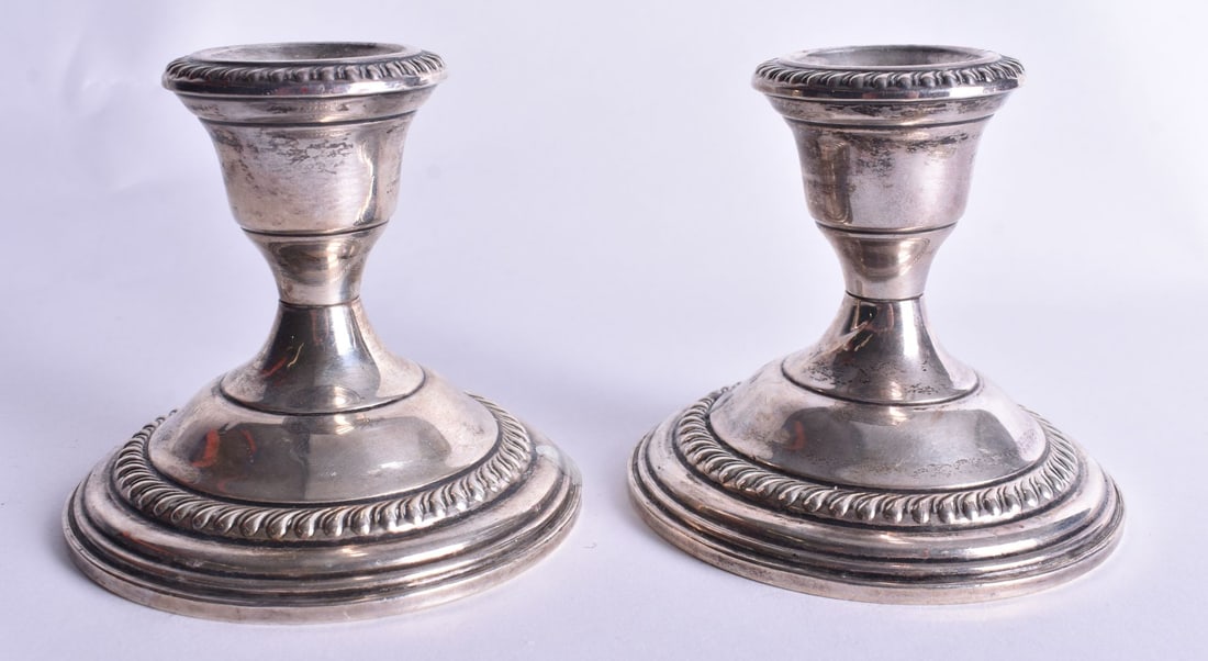 A Pair of Weighted Silver Squat Candlesticks. Stamped Sterling. 7.5cm high, total weight 397g (2) (1 of 3)