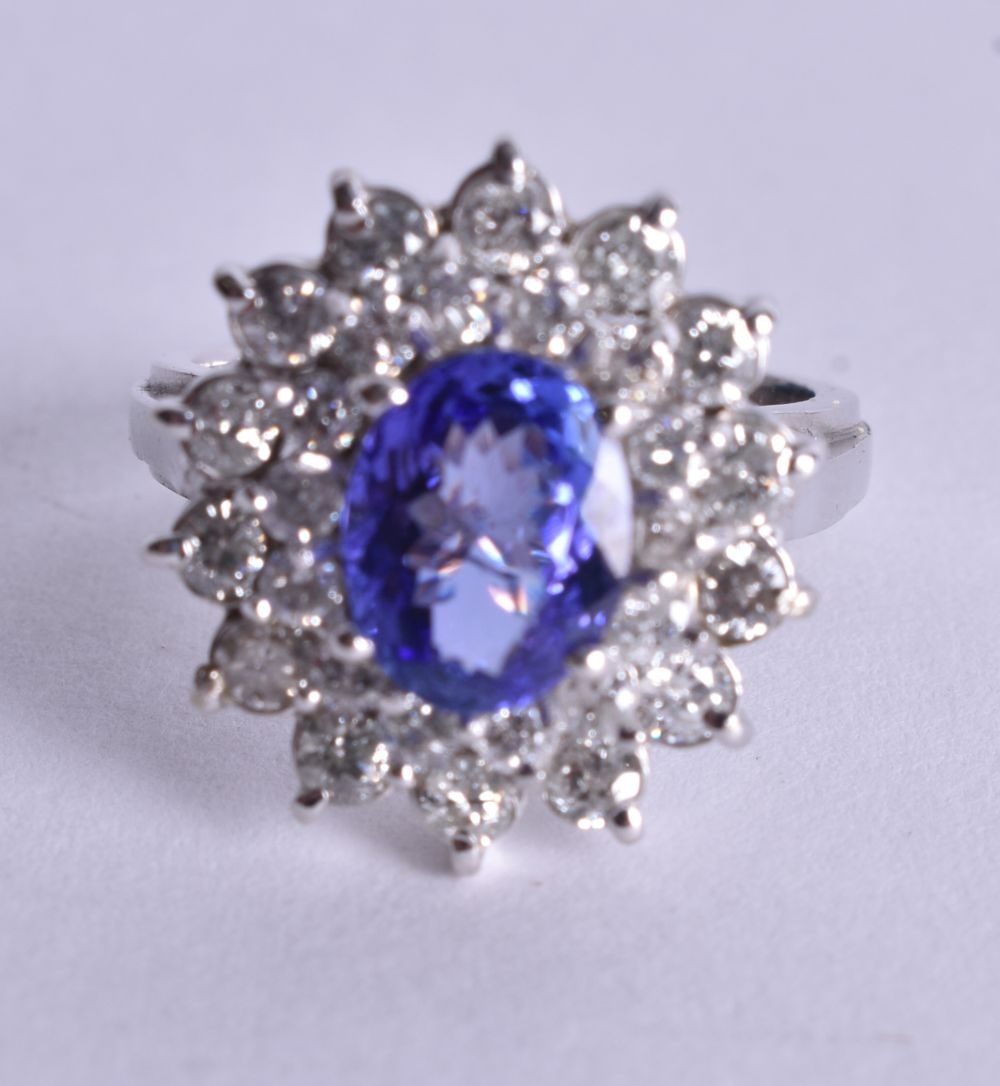 A 14 Carat White Gold, Diamond and Tanzanite Ring. Stamped 14K, Size L, weight 5.6g (1 of 4)